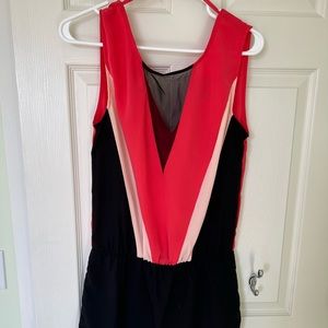 Short party dress with sheer panel. Great pink/black colours. Size small